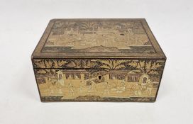 19th century Chinese lacquered box in black and gold, allover decorated with figures carrying boxes,