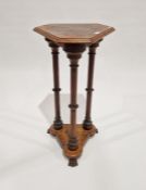 19th century oak jardiniere stand, raised on three turned pillar supports, mounted on a pedestal