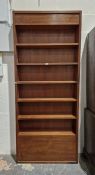 Large 20th century bookcase having six fitted shelves, 196cm high x 85cm wide x 19cm deep