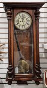 Early 20th century mahogany cased Vienna regulator style wall clock, the circular dial having