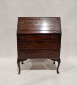 Early 20th century mahogany bureau, the drop front opening to reveal pigeonholes and a single