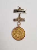 9ct gold Great Western Railways 15 years first aid efficiency medal on suspender, with two metal