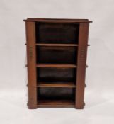 20th century oak bookshelf having four shelves and three rounded corner shelves on each side,