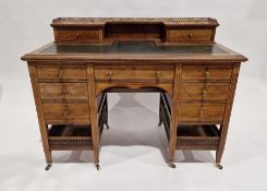 Victorian rosewood desk by Edwards & Roberts, the galleried top section containing two short