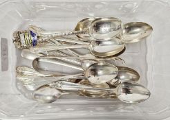 Quantity of silver spoons and other flatware, including a pair of bird claw sugar tongs, teaspoons