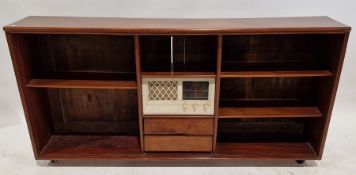 20th century low mahogany bookcase with four fitted shelves, two small drawers and a fitted