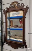 Late 19th/early 20th century mahogany wall mirror with gilt decorated eagle finial to top, 91cm high