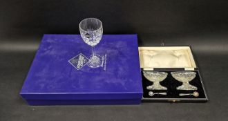 Cased pair of Regency-style boat-shaped salts and silver spoons, hallmarked Sheffield 1954, together