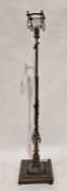 20th century brass standard lamp raised on square pedestal base, 179cm high