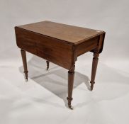 Late 19th/early 20th century mahogany pembroke table raised on turned legs, with original ceramic