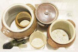 Five stoneware storage jars and a stoneware flaggon stamped 'Pearsons' (6)