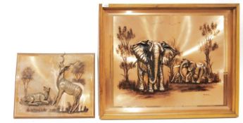 Copper plaque with mounted resin models of elephants and another copper plaque with mounted resin