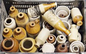 Quantity of stoneware bottles, flagons and storage jars, some named to include Robertsons ginger