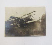 A WWI era scrapbook containing numerous newspaper cuttings of WWI aircraft and some real