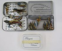 The Wheatley Metal Salmon Fly Box with flies, another folding fly box with salmon and other flies