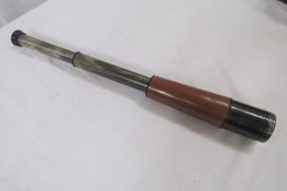 Leather cased three draw telescope made by Dollond, London. Leather cased Dr Wohler Saar