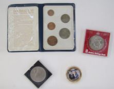 Small quantity of coins, a German pocket 4x20 black japanned metal monocular with black morocco