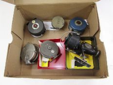 The Gemina fishing reel, a brass fly fishing reel, a Mitchell 756 single action fly reel, a Mitchell