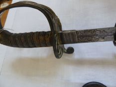 1889 pattern infantry officers sword by the Army & Navy cooperative society London, with ornate