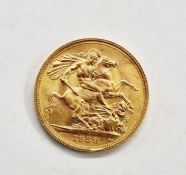 Elizabeth II (1952-2022) Sovereign, 1958. First, laureate head of Elizabeth II facing right, St