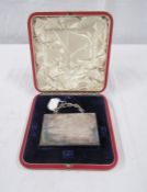 Silver plated section of armour plate from HMS Ocean, dated 1897, cased.