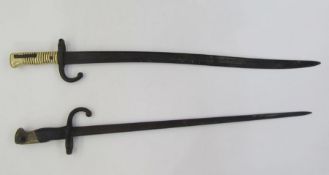 WWI French Gras bayonet together with a late 19th century French Chassepot bayonet.