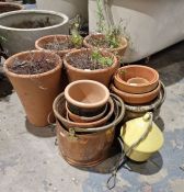 Four tall flared terracotta planters, 2 copper and brass coal scuttles, a bird nesting box /feeder
