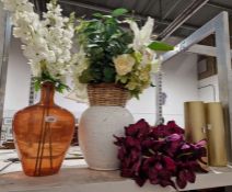 Assortment of vases and fake flowers