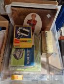 Metz Meckablitz 180 camera flash, a Kodak Instamatic M22 movie camera, four milk glass storage jars,