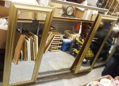 Three contemporary wall mirrors including a large silver-framed example, 90cm x 111cm and two