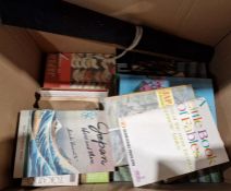 Japanese folding lacquered table with inlaid mother-of-pearl decoration, a quantity of books on