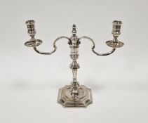 Elizabeth II silver candelabrum of revived Georgian-style, having two scroll branches and on knopped