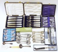 Quantity of assorted silver plated flatware, some in original boxes, to include spoons, butter