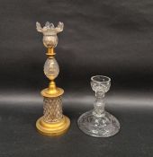 Georgian-style cut-glass and gilt-metal mounted candlestick and a baluster cut-glass candlestick,