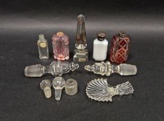 Group of Victorian coloured glass scent bottles, a Regency cut-glass fan-shaped caddy spoon and