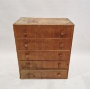 20th century oak chest of drawers having five long drawers each with turned wooden handles, 90cm