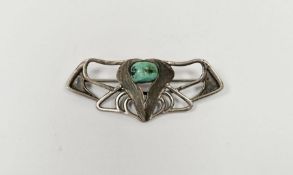 Cymric Liberty's Art Nouveau silver-coloured metal and turquoise brooch of scroll design with