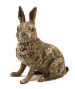 Cold-painted hare inkwell having hinged head, 14cm high