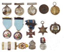 WWII Defence medal, a WWI medal to Private A Young RFUS, an Italy Star and other various medals