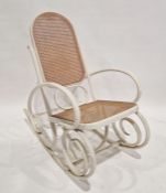 White painted bentwood rocking armchair with cane back and seat