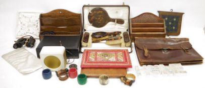 Two wooden letter racks, small leather document case, napkin rings, cased dressing table set and