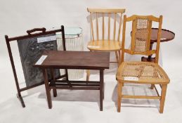 Mahogany framed hammered metal firescreen with scene depicting a squirrel eating a nut, 72cm high