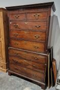 A Georgian mahogany chest on chest, having two short over six long drawers, with later brass handles