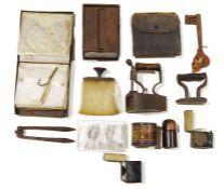 Old metal box iron having sliding door and turned wood handle, a miniature flat iron, an old key,