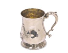 George III silver baluster tankard with double scroll handle, embossed with a centre and engraved