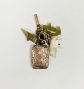 Gold plated locket inset with plaited hair, onyx and mother-of-pearl pig charms, onyx boot charm and