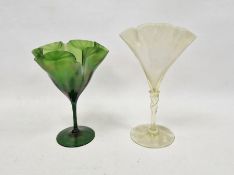 Loetz-style Art Nouveau green lustred frilled footed vase and a vaseline glass vase similar, the