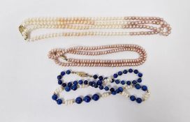 Short pink cultured pearl necklace and a freshwater pearl and lapis lazuli necklace (2)