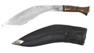 Kukri with brass-bound wooden handle, 31cm long and leather sheath
