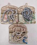 Three strings of modern pearls including string of grey pearls